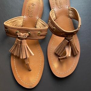 Coach “Sheena” leather tassel sandals